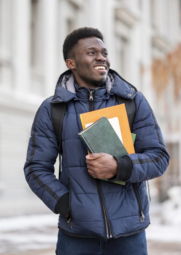 portrait-male-student-with-books